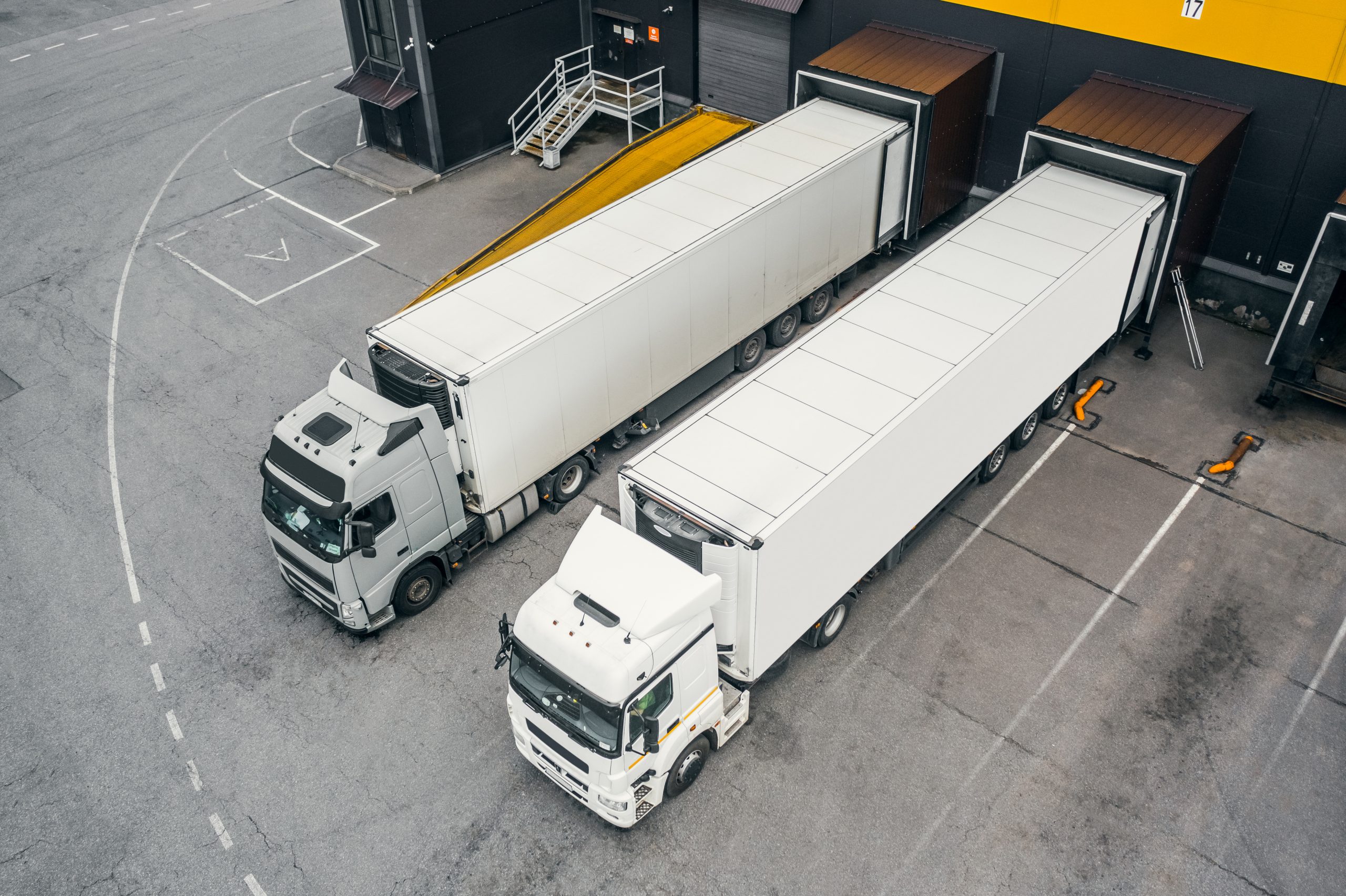 trucks in distribution hub, overhead view